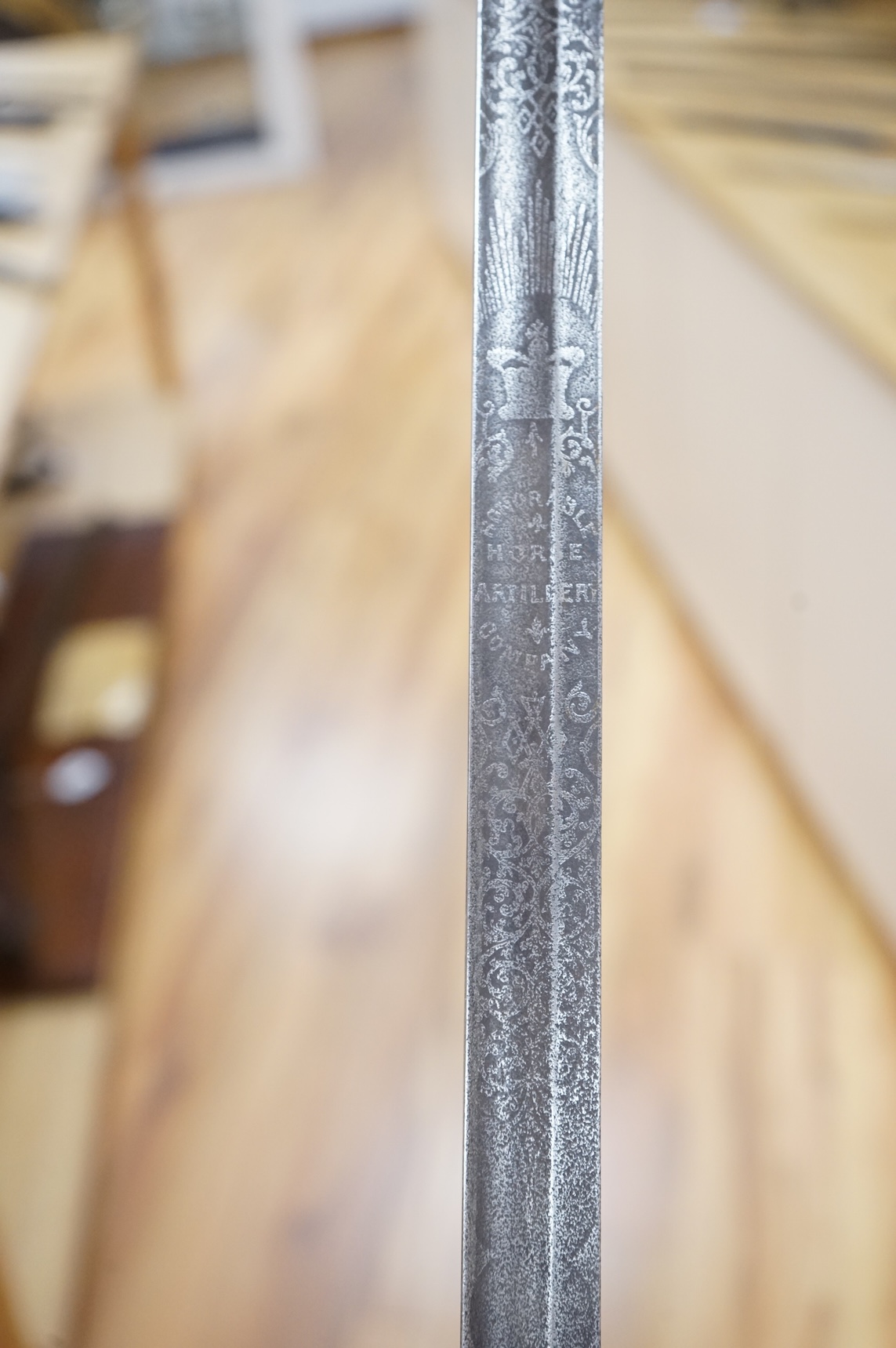 A Victorian 1845 pattern infantry officer’s levee sword, with slender blade etched; Hamburger Rogers & Co., and crowned VR and foliage, regulation pierced brass guard with folding side guard, wire bound fish skin covered